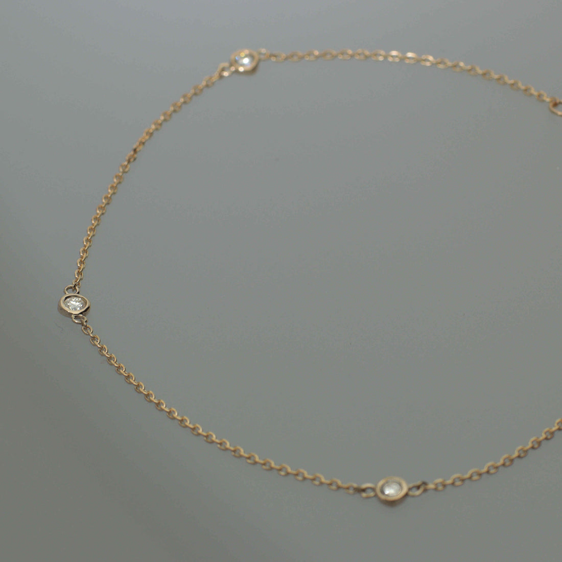 K10 ダイヤモンド 3石 覆輪 ブレスレット