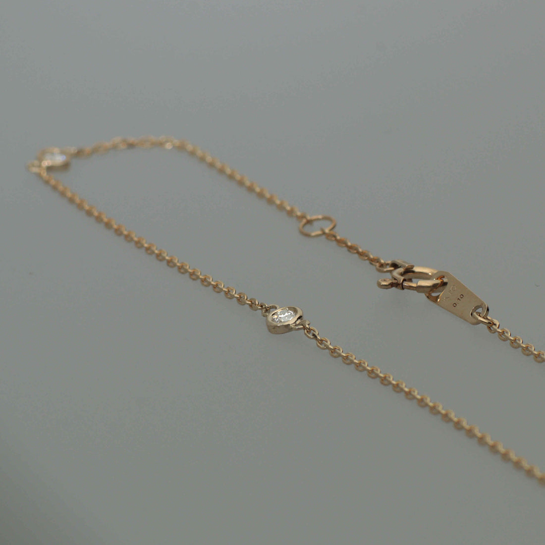 K10 ダイヤモンド 3石 覆輪 ブレスレット