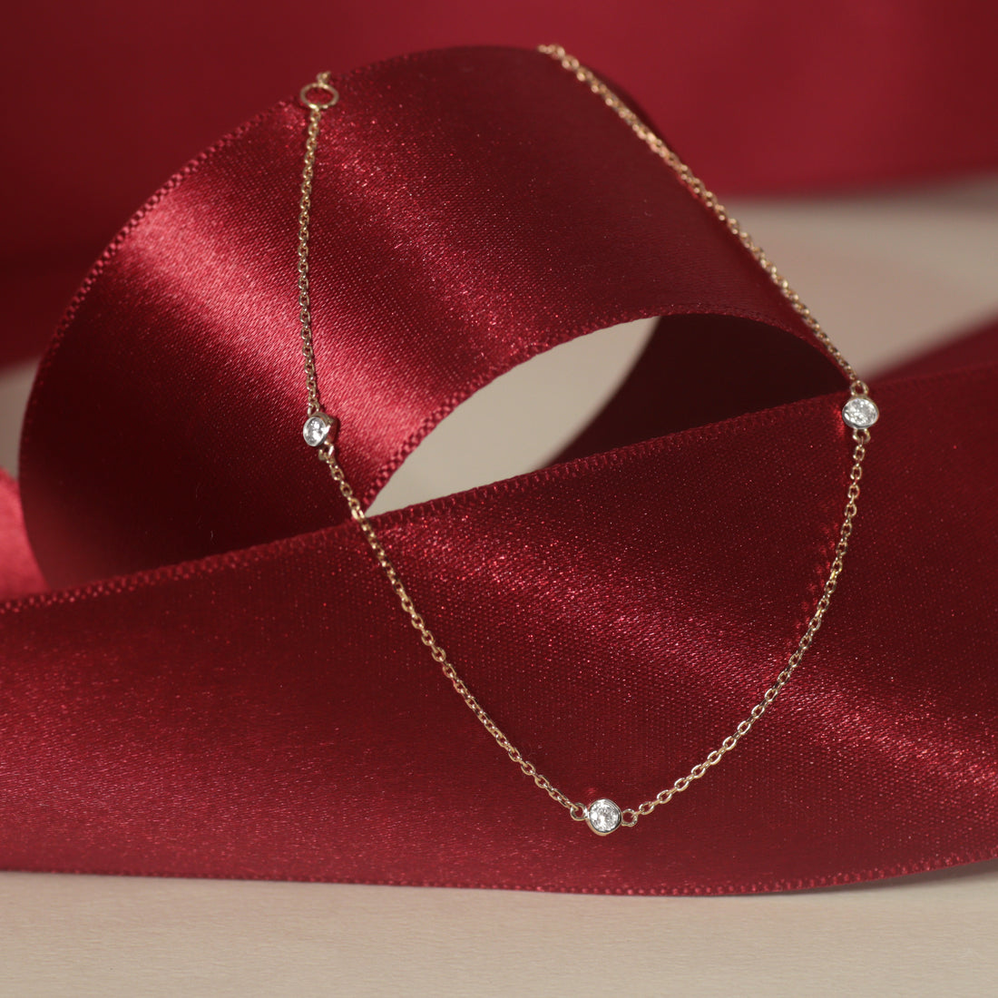 K10 ダイヤモンド 3石 覆輪 ブレスレット